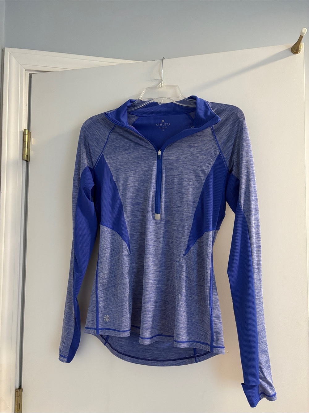 Athleta Forerunner half-zip pullover featuring a blue space-dye knit pattern